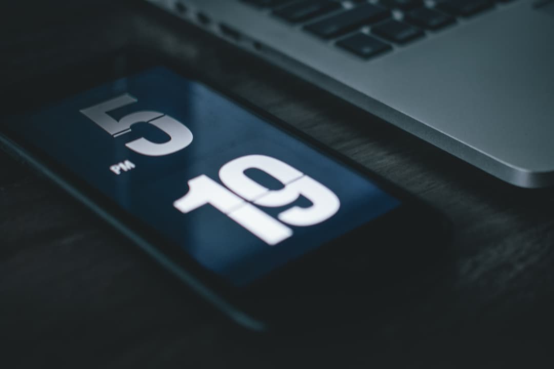 Mobile phone close up displaying the time