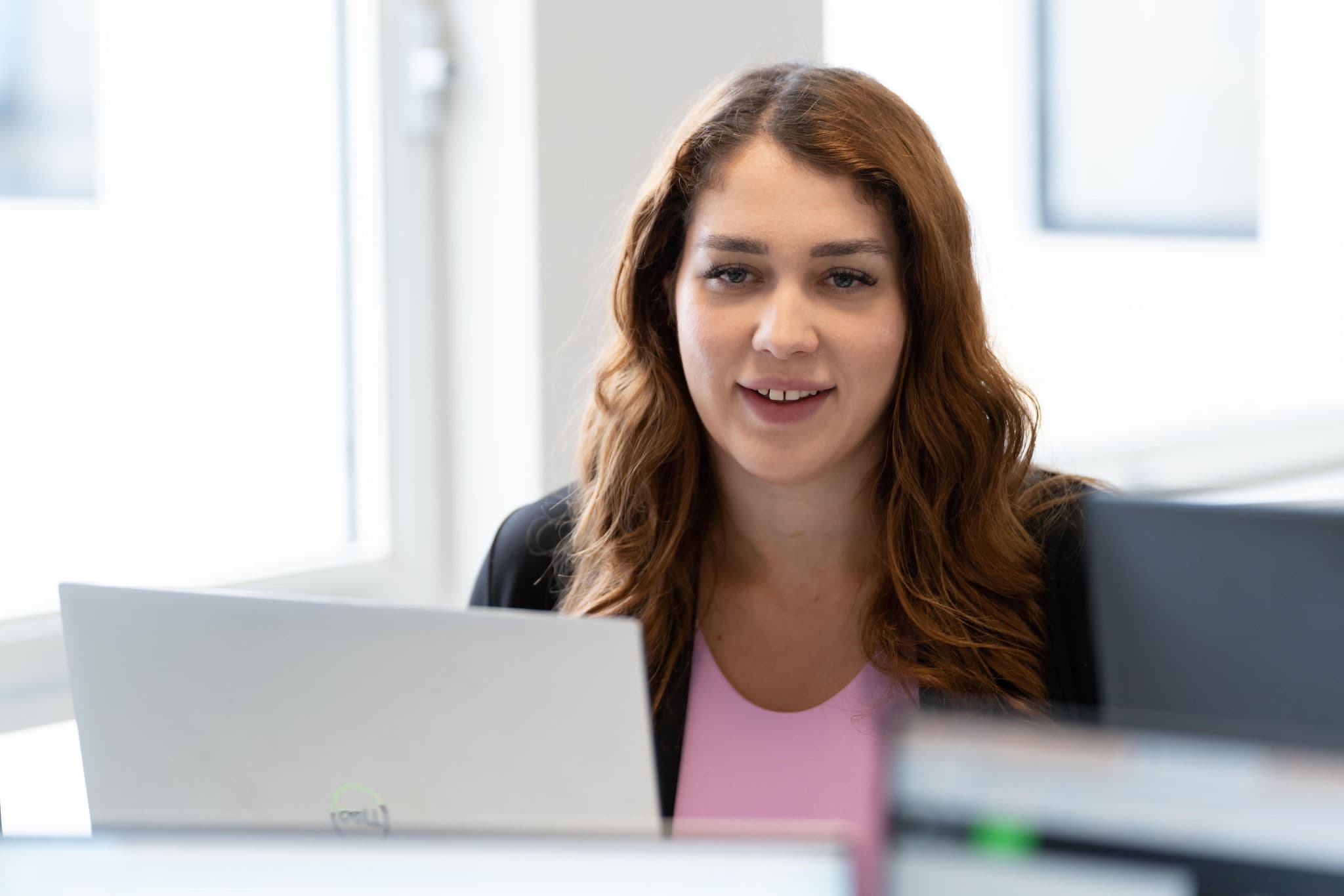 A woman working at her desk