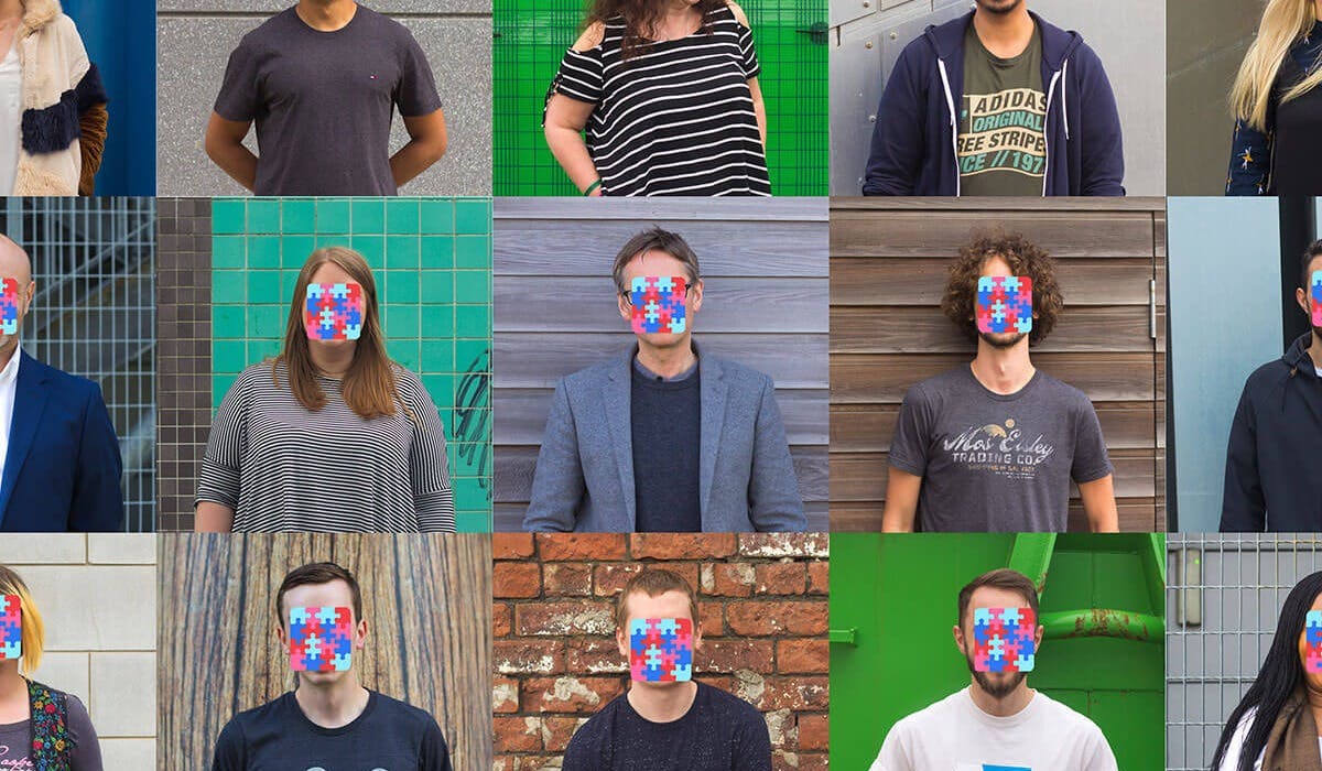 Apadmi employees with jigsaw pieces covering their faces